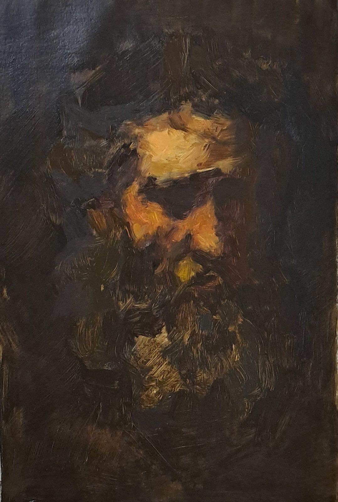 Dramatically lit head study in oil